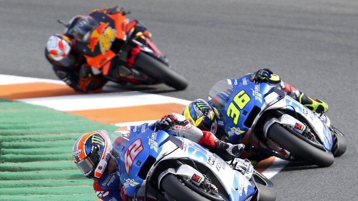 Alex Rins Spains rider Alex Rins of the Team SUZUKI ECSTAR leads on Spains rider Joan Mir of the Team SUZUKI ECSTARand Spains rider Pol Espargaro of the Red Bull KTM Factory Racing in the MotoGP race during the European Grand Prix in Valencia, Spain, Sunday, Nov. 8, 2020. (AP Photo/Alberto Saiz)