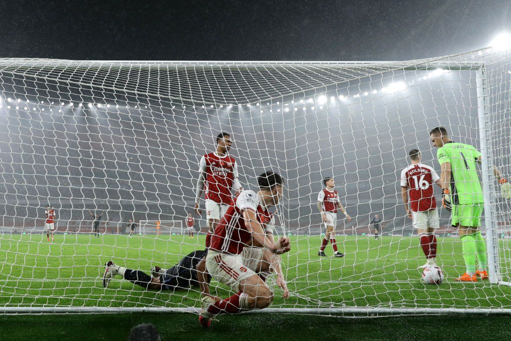 Arsenal LONDON, ENGLAND - NOVEMBER 08: Mohamed Elneny of Arsenal looks dejected following Aston Villa's second goal during the Premier League match between Arsenal and Aston Villa at Emirates Stadium on November 08, 2020 in London, England. Sporting stadiums around the UK remain under strict restrictions due to the Coronavirus Pandemic as Government social distancing laws prohibit fans inside venues resulting in games being played behind closed doors. (Photo by Andy Rain - Pool/Getty Images)