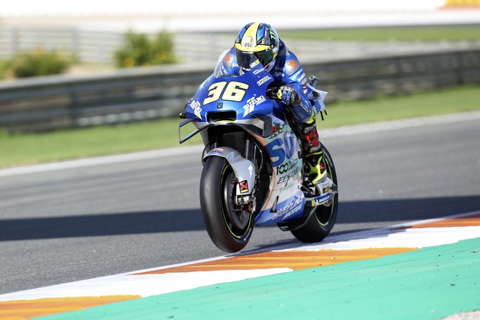 Spains rider Joan Mir of the Team SUZUKI ECSTAR leads in the MotoGP race during the European Grand Prix in Valencia, Spain, Sunday, Nov. 8, 2020. (AP Photo/Alberto Saiz)
