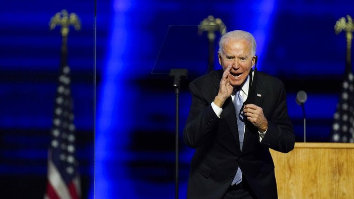 President-elect Joe Biden joins Vice President-elect Kamala Harris on stage Saturday, Nov. 7, 2020, in Wilmington, Del. (AP Photo/Andrew Harnik, Pool)
