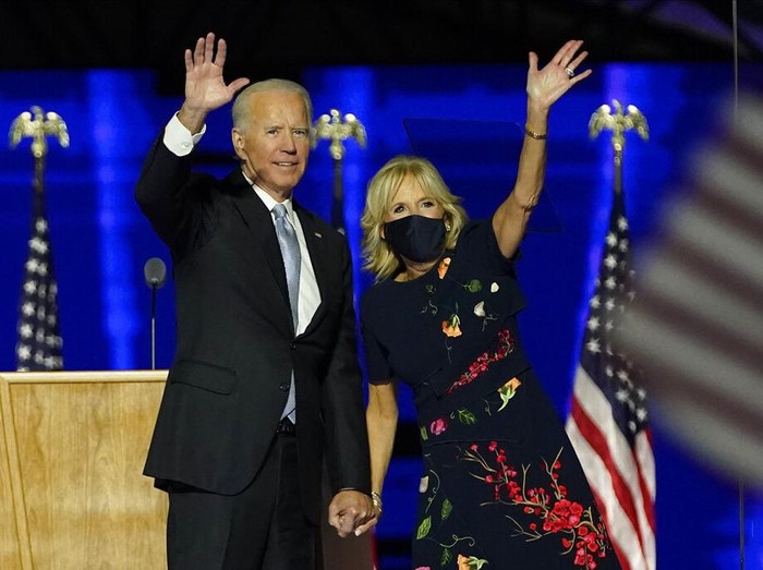 President-elect Joe Biden joins Vice President-elect Kamala Harris on stage Saturday, Nov. 7, 2020, in Wilmington, Del. (AP Photo/Andrew Harnik, Pool)