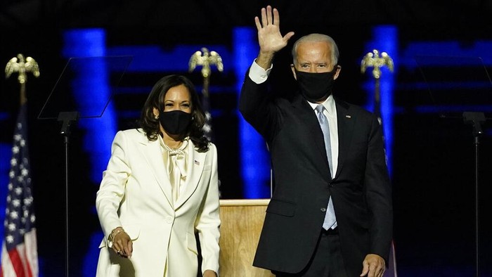 President-elect Joe Biden joins Vice President-elect Kamala Harris on stage Saturday, Nov. 7, 2020, in Wilmington, Del. (AP Photo/Andrew Harnik, Pool)
