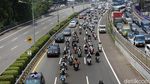 Potret Pemotor Masuk Tol Dalam Kota
