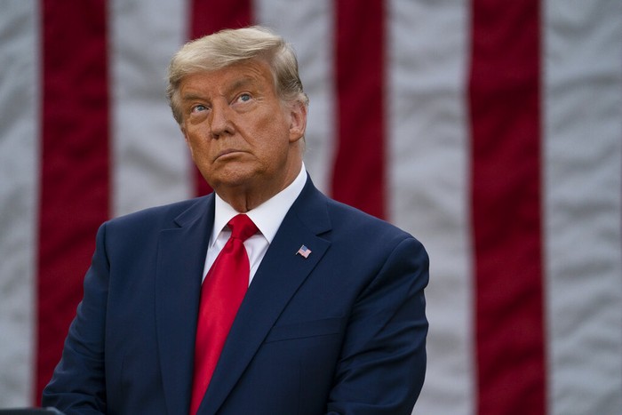Donald Trump President Donald Trump listens during an event on Operation Warp Speed in the Rose Garden of the White House, Friday, Nov. 13, 2020, in Washington. (AP Photo/Evan Vucci)