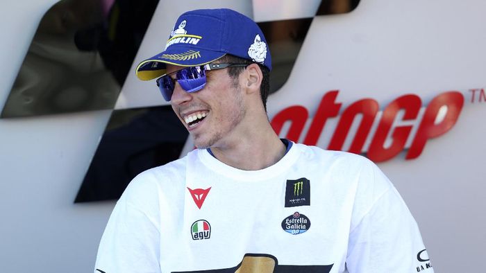 Joan Mir 2020 World champion, Spains rider Joan Mir of the Team SUZUKI ECSTAR celebrates ash the end of the MotoGP Valencia Grand Prix in Ricardo Tormo Circuit in Valencia, Spain, Sunday, Nov. 15, 2020. (AP Photo/Alberto Saiz)