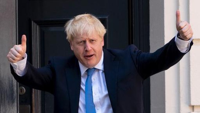 (FILES) In this file photo taken on July 23, 2019 new Conservative Party leader and incoming prime minister Boris Johnson arrives at the Conservative party headquarters in central London. - On July 23, 2019, party members choose Brexit figurehead Boris Johnson as their new leader. He becomes prime minister the next day. (Photo by Niklas HALLEN / AFP)