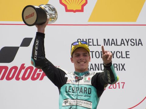 KUALA LUMPUR, MALAYSIA - OCTOBER 29: Joan Mir of Spain and Leopard Racing celebrates the victory on the podium at the end of the Moto3 race during the MotoGP Of Malaysia - Race at Sepang Circuit on October 29, 2017 in Kuala Lumpur, Malaysia. (Photo by Mirco Lazzari gp/Getty Images)