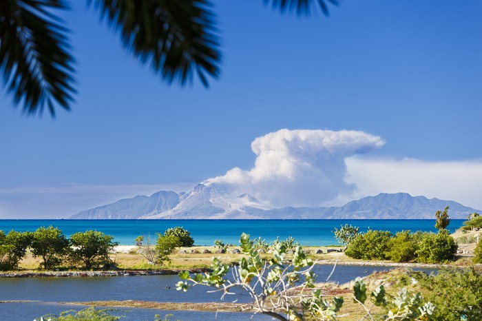 View to the active volcano in Montserrat with a large ash cloud.