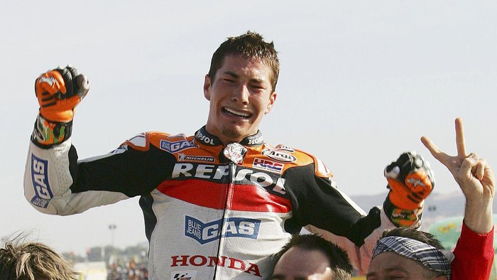 VALENCIA, SPAIN - OCTOBER 29: Nicky Hayden of the U.S. reacts after clinching the World MotoGP title after finishing third in the MotoGP race in the Ricardo Torma racetrack on October 29, 2006 in Valencia, Spain.  (Photo by Denis Doyle/Getty Images)