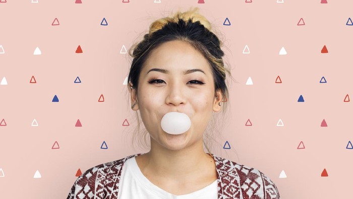 Young Girl Chewing Bubble Gum Concept