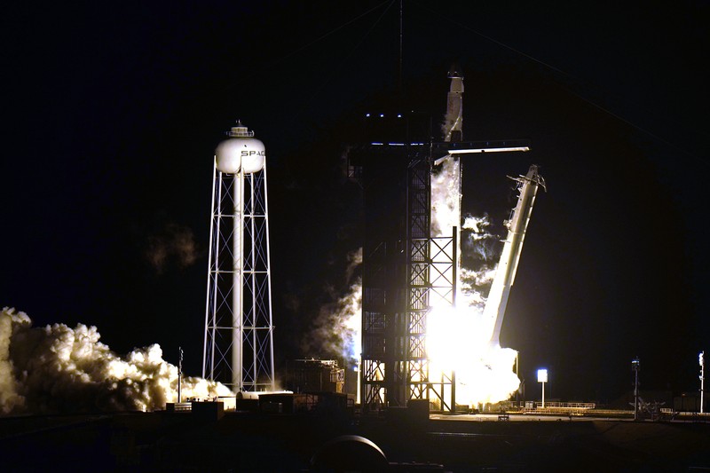 A SpaceX Falcon9 rocket, with the Crew Dragon capsule attached, lift's off from Kennedy Space Center's Launch Complex 39-A Sunday Nov. 15, 2020, in Cape Canaveral, Fla. Four astronauts are beginning a mission to the international Space Station. (AP Photo/Chris O'Meara)
