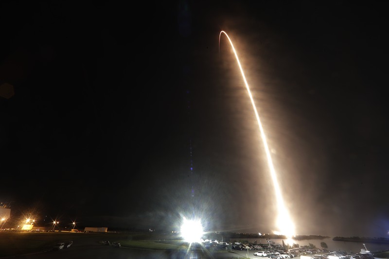 The countdown clock is stopped at a three-hour built in hold as a SpaceX Falcon 9 rocket, with the company's Crew Dragon capsule attached, sits on the launch pad at Launch Complex 39A Sunday, Nov. 15, 2020, at the Kennedy Space Center in Cape Canaveral, Fla. Four astronauts will fly on the SpaceX Crew-1 mission to the International Space Station scheduled for launch on later today. (AP Photo/Chris O'Meara)