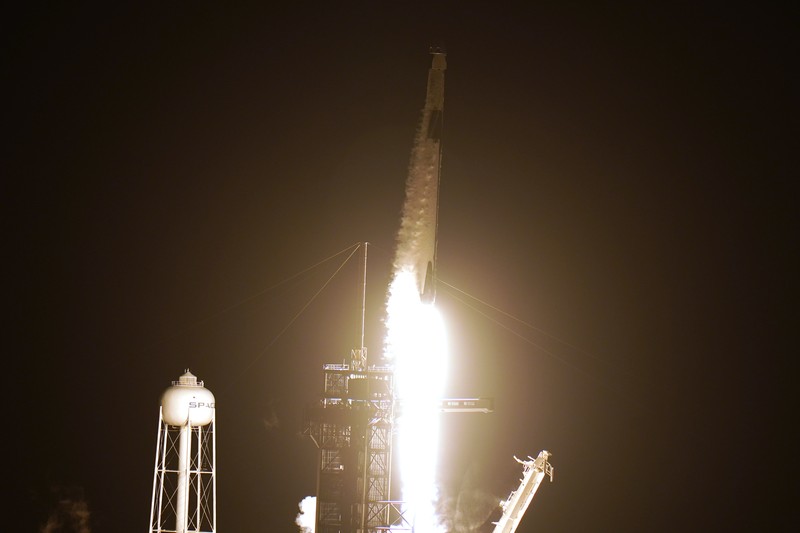 A SpaceX Falcon9 rocket, with the Crew Dragon capsule attached, lift's off from Kennedy Space Center's Launch Complex 39-A Sunday Nov. 15, 2020, in Cape Canaveral, Fla. Four astronauts are beginning a mission to the international Space Station. (AP Photo/Chris O'Meara)