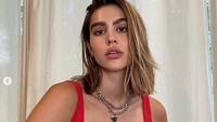 Model yang sebentar lagi berusia 20 tahun itu kepergok tengah berduaan di pantai. Dok. Instagram/ameliagrey
