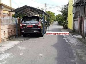 Viral Mobil Pelat Merah Parkir di Jalan Umum Pakai Tenda Pula, Begini Ceritanya