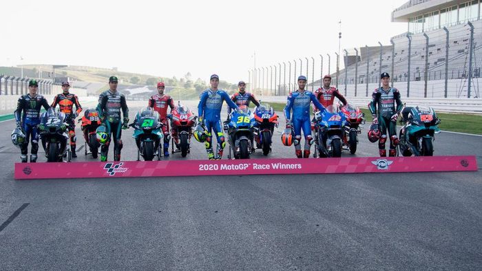 MotoGP Portugal 2020 PORTIMAO, PORTUGAL - NOVEMBER 19: (L-R) Maverick Vinales of Spain and Monster Energy Yamaha MotoGP Team, Brad Binder of South Africa and Red Bull KTM Factory Racing , Franco Morbidelli of Italy and Petronas Yamaha SRT, Andrea Dovizioso of Italy and Ducati Team, Joan Mir of Spain and Team Suzuki ECSTAR, Miguel Oliveira of Portugal and Team KTM Tech 3 , Alex Rins of Spain and Team Suzuki ECSTAR, Danilo Petrucci of Italy and Ducati Team and Fabio Quartararo of France and Petronas Yamaha SRT pose near the bike during the