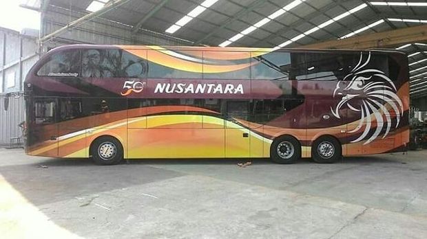 Bus tingkat bodi Conqueror buatan karoseri Nusantara Gemilang