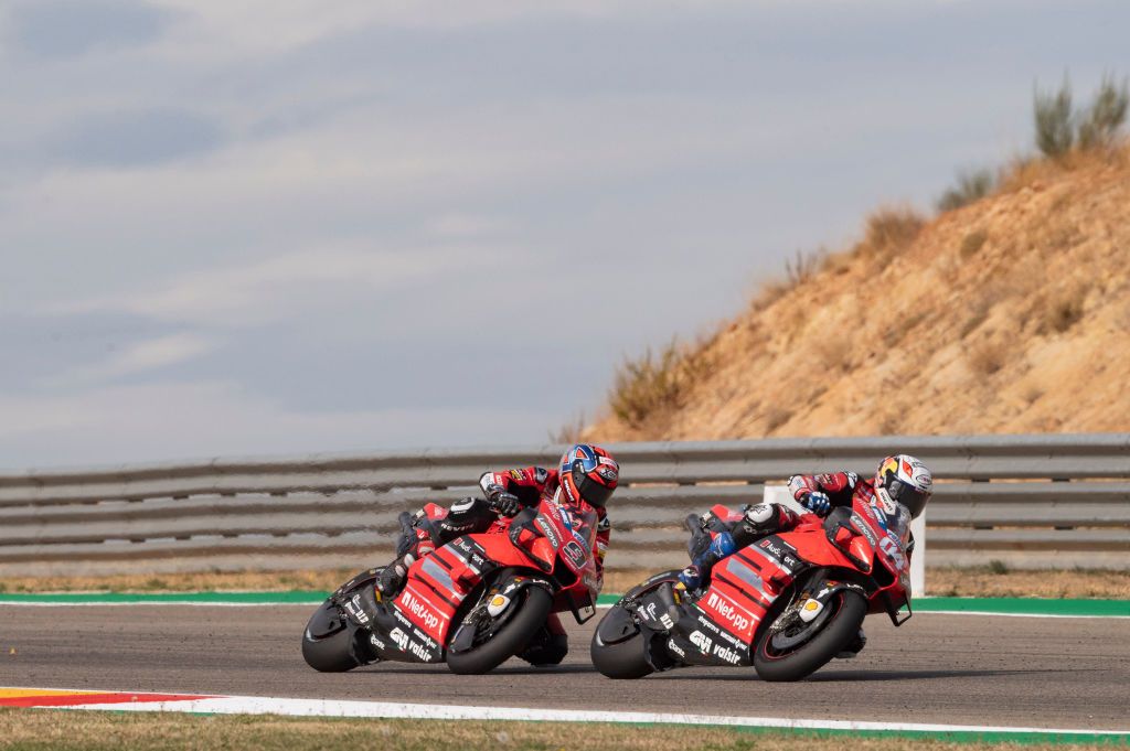 ALCANIZ, SPAIN - OCTOBER 25: Andrea Dovizioso of Italy and Ducati Team leads  Danilo Petrucci of Italy and Ducati Team during the MotoGP race during the MotoGP of Teruel at Motorland Aragon Circuit on October 25, 2020 in Alcaniz, Spain. (Photo by Mirco Lazzari gp/Getty Images)