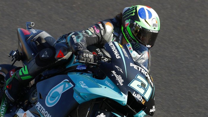 MotoGP rider Franco Morbidelli of Italy steers his motorcycle during a free practice session for the Portuguese Motorcycle Grand Prix, the last race of the season, at the Algarve International circuit near Portimao, Portugal, Saturday, Nov. 21, 2020. The Portuguese Grand Prix will be held Sunday. (AP Photo/Armando Franca
