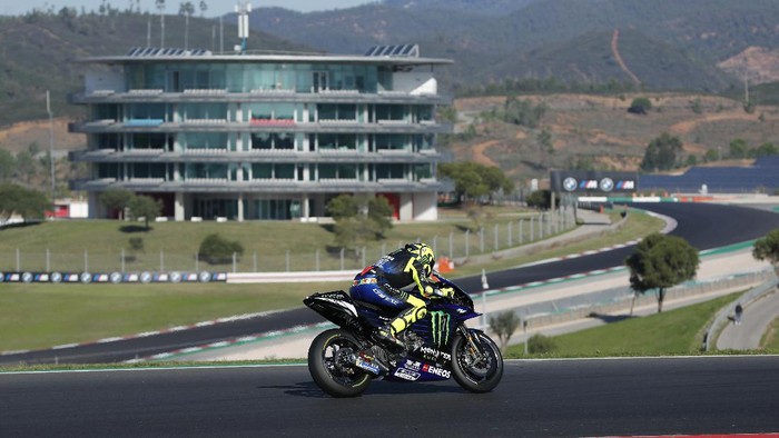 MotoGP rider Valentino Rossi of Italy steers his motorcycle during a free practice session for the Portuguese Motorcycle Grand Prix, the last race of the season, at the Algarve International circuit near Portimao, Portugal, Saturday, Nov. 21, 2020. The Portuguese Grand Prix will be held Sunday. (AP Photo/Armando Franca