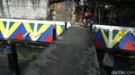 Warna-warni Dinding Kali Utan Kayu di Jakarta Timur