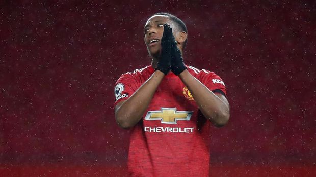Anthony Martial MANCHESTER, ENGLAND - NOVEMBER 21: Anthony Martial of Manchester United reacts during the Premier League match between Manchester United and West Bromwich Albion at Old Trafford on November 21, 2020 in Manchester, England. Sporting stadiums around the UK remain under strict restrictions due to the Coronavirus Pandemic as Government social distancing laws prohibit fans inside venues resulting in games being played behind closed doors. (Photo by Martin Rickett - Pool/Getty Images)
