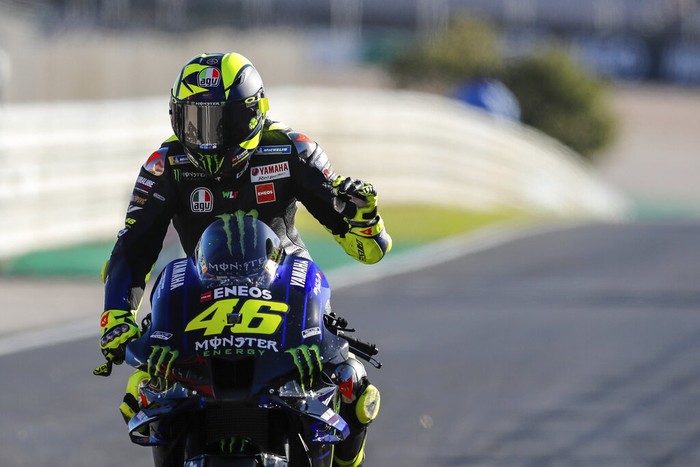MotoGP rider Valentino Rossi of Italy reacts at the end of the Portuguese Motorcycle Grand Prix, the last race of the season, at the Algarve International circuit near Portimao, Portugal, Sunday, Nov. 22, 2020. (AP Photo/Armando Franca)