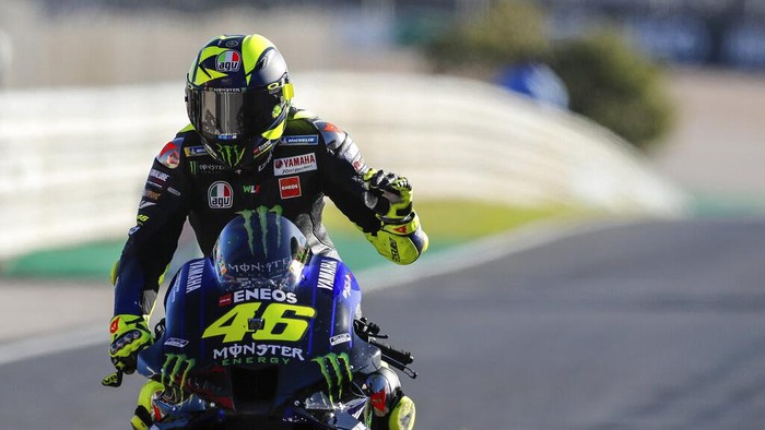 MotoGP rider Valentino Rossi of Italy reacts at the end of the Portuguese Motorcycle Grand Prix, the last race of the season, at the Algarve International circuit near Portimao, Portugal, Sunday, Nov. 22, 2020. (AP Photo/Armando Franca)
