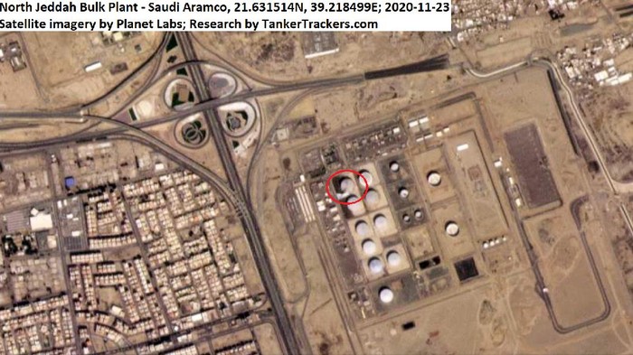 This Monday, Nov. 23, 2020 satellite image from Planet Labs Inc. annotated by TankerTrackers.com, shows a damaged tank and fire-suppressing foam on the ground at a Saudi Arabian Oil Co. facility in Jiddah, Saudi Arabia. Yemens Houthi rebels said they struck a Saudi oil facility in the port city of Jiddah on Monday with a new cruise missile, just hours after the kingdom finished hosting its virtual Group of 20 leaders summit. (Planet Labs Inc. via AP)