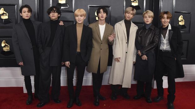 FILE - BTS arrives at the 62nd annual Grammy Awards in Los Angeles on Jan. 26, 2020. The K-pop band is nominated for a Grammy Award for best pop duo/group performance with “Dynamite,