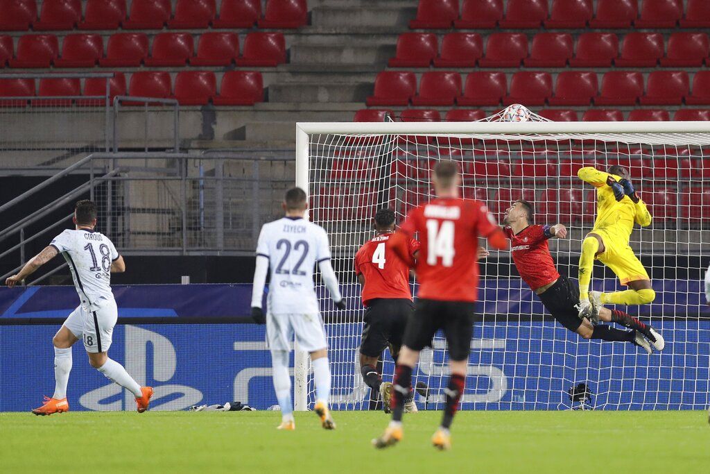 Olivier Giroud Chelsea's Olivier Giroud, center, celebrates with his teammates after scoring his side's second goal during the Champions League, group E soccer match between Rennes and Chelsea at the Roazhon Park stadium in Rennes, France, Tuesday, Nov. 24, 2020. Chelsea won 2-1. (AP Photo/David Vincent)