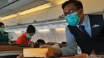 Suasana Terbang Naik Garuda Indonesia Dilengkapi Protokol Kesehatan