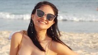 Ia pun memutuskan untuk melepas hijabnya pada 2014 dan kini dirinya kembali membuat heboh dengan unggahan lama kala tampil berbikini. Dok. Instagram/marshanda99