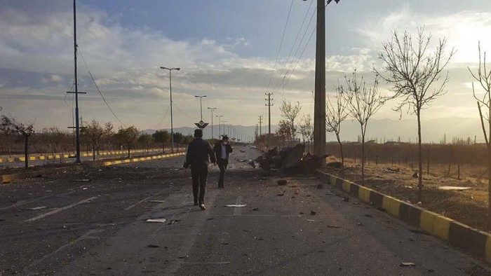 This photo released by the semi-official Fars News Agency shows the scene where Mohsen Fakhrizadeh was killed in Absard, a small city just east of the capital, Tehran, Iran, Friday, Nov. 27, 2020.  Fakhrizadeh, an Iranian scientist that Israel alleged led the Islamic Republics military nuclear program until its disbanding in the early 2000s was “assassinated” Friday, state television said.  (Fars News Agency via AP)