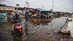Pelabuhan Kali Adem Kembali Terendam Banjir Rob