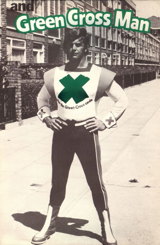English actor Dave Prowse as the Green Cross Man for a road safety campaign aimed at children and promoting 'The Green Cross Code', 1977.  (Photo by Evening Standard/Hulton Archive/Getty Images)