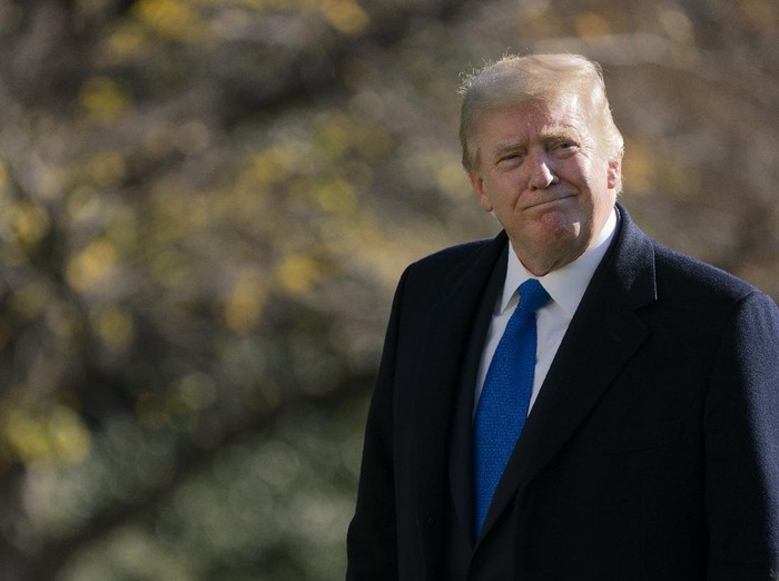 President Donald Trump walks on the South Lawn of the White House in Washington, Sunday, Nov. 29, 2020, after stepping off Marine One. Trump is returning from Camp David. (AP Photo/Patrick Semansky)