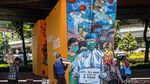 Mural Lawan Corona Hiasi Kolong Tol Tomang