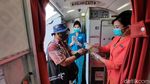 Suasana Terbang Naik Garuda Indonesia Dilengkapi Protokol Kesehatan