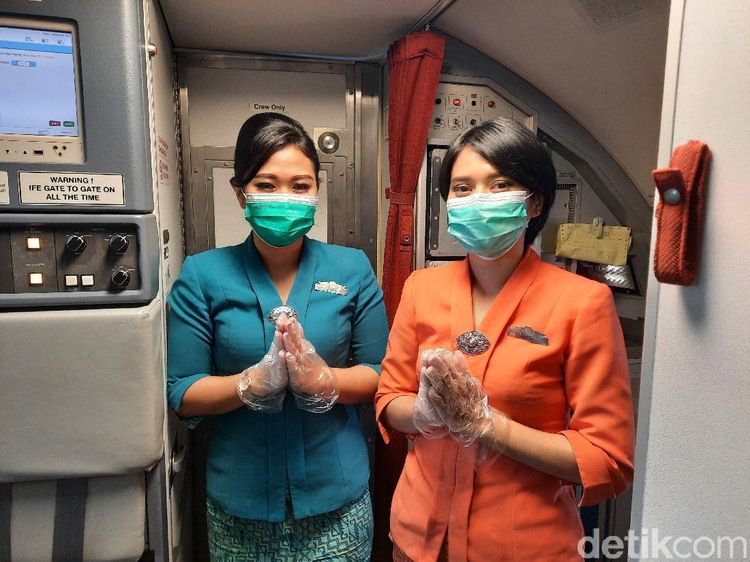 Suasana Terbang Naik Garuda Indonesia Dilengkapi Protokol Kesehatan