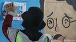 Mural Protokol Kesehatan Hiasi 100 Tiang di Jakarta Timur
