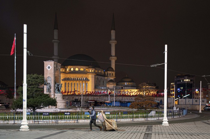 A view of deserted streets in Istanbul during a curfew Tuesday, Dec. 1, 2020, part of the new measures to try curb the spread of the coronavirus. Turkey had gone into the most widespread lockdown so far amid a surge in COVID-19 infections, extending curfews to weeknights and full lockdowns over weekends. The curfew would be implemented on weekdays between 9:00 pm and 5:00 am. He also announced total weekend lockdowns from 9:00 pm on Friday evenings to 5:00 am Monday. (AP Photo)