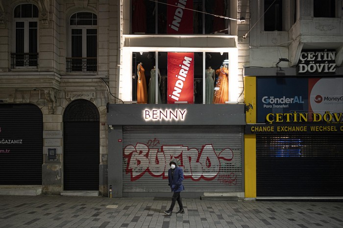 A view of deserted streets in Istanbul during a curfew Tuesday, Dec. 1, 2020, part of the new measures to try curb the spread of the coronavirus. Turkey had gone into the most widespread lockdown so far amid a surge in COVID-19 infections, extending curfews to weeknights and full lockdowns over weekends. The curfew would be implemented on weekdays between 9:00 pm and 5:00 am. He also announced total weekend lockdowns from 9:00 pm on Friday evenings to 5:00 am Monday. (AP Photo)