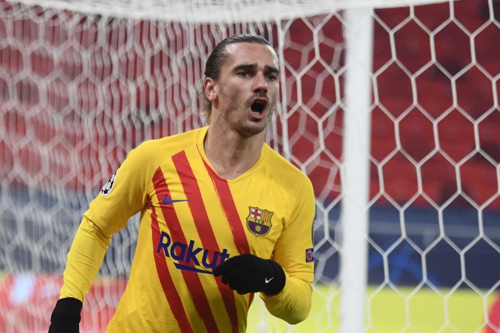 Barcelonas French forward Antoine Griezmann celebrates scoring during the UEFA Champions League football match Ferencvaros TC v FC Barcelona in Budapest on December 2, 2020. (Photo by Attila KISBENEDEK / AFP)