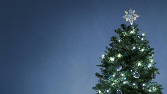 2020 New Year Alternative Christmas trees homemade cookies Christmas-tree decorations-balls lying on a blue background. Close-up, horizontal layout, copy space.