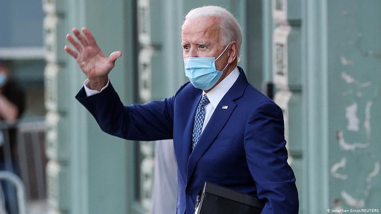 Joe Biden Minta Masyarakat AS Pakai Masker dalam 100 Hari Pertama Program Kerjanya Joe Biden Minta Masyarakat AS Pakai Masker dalam 100 Hari Pertama Program Kerjanya