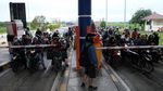 Imbas Banjir, Pemotor Nekat Terobos Tol Medan-Binjai