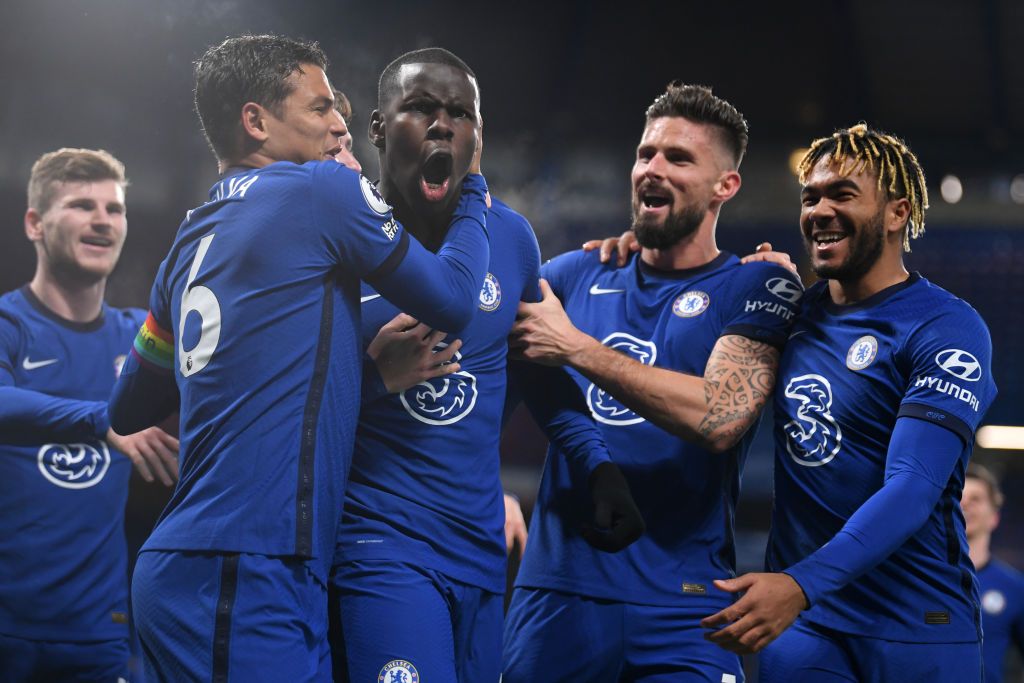 Chelsea vs Leeds United LONDON, ENGLAND - DECEMBER 05: Kurt Zouma of Chelsea celebrates with teammates Thiago Silva, Olivier Giroud and Reece James after scoring their team's second goal during the Premier League match between Chelsea and Leeds United at Stamford Bridge on December 05, 2020 in London, England. A limited number of fans are welcomed back to stadiums to watch elite football across England. This was following easing of restrictions on spectators in tiers one and two areas only. (Photo by Mike Hewitt/Getty Images)