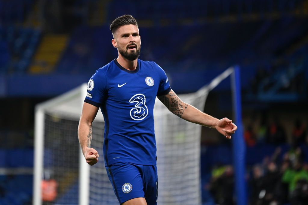 Olivier Giroud LONDON, ENGLAND - DECEMBER 05: Olivier Giroud of Chelsea celebrates after scoring their team's first goal during the Premier League match between Chelsea and Leeds United at Stamford Bridge on December 05, 2020 in London, England. A limited number of fans are welcomed back to stadiums to watch elite football across England. This was following easing of restrictions on spectators in tiers one and two areas only. (Photo by Daniel Leal-Olivas - Pool/Getty Images)