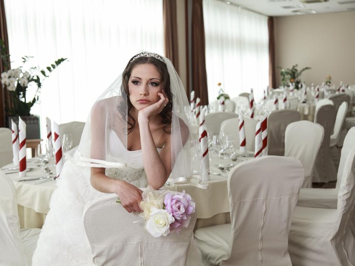 1129105375 Ilustrasi wanita yang batal nikah.